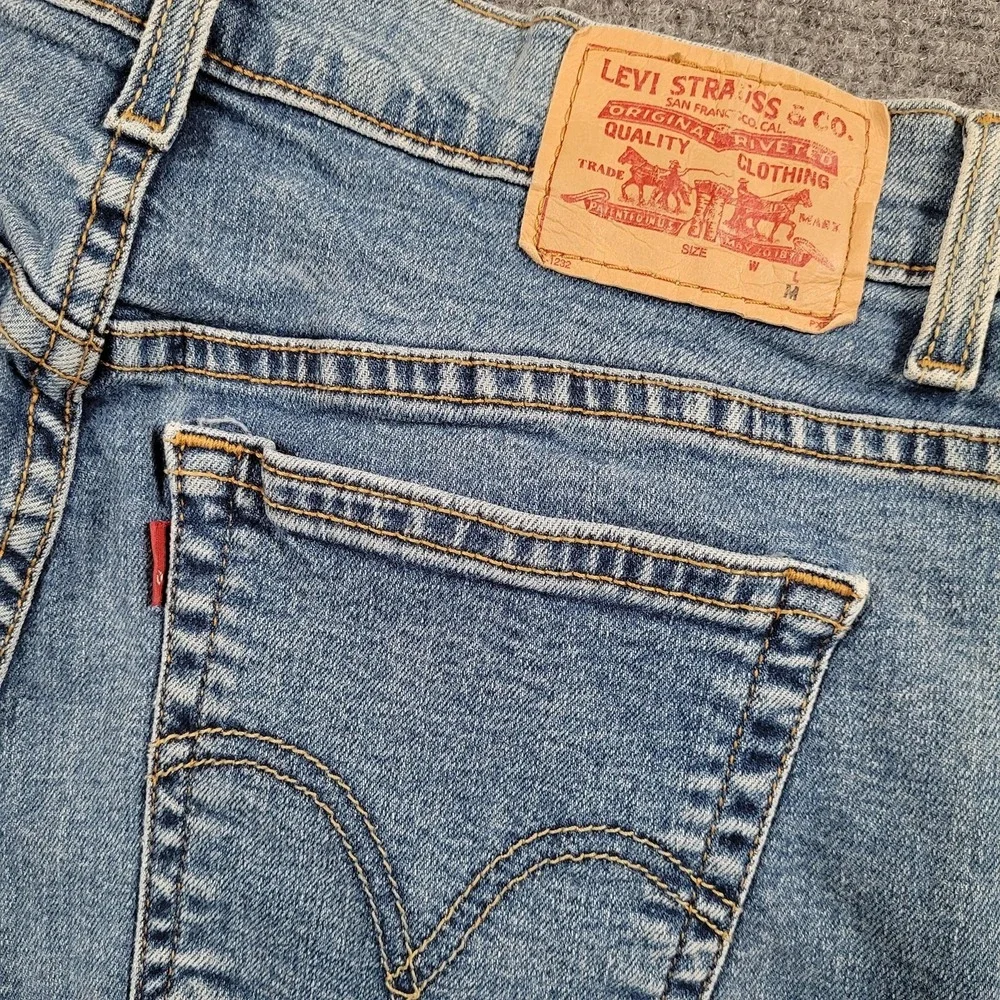 Levis Classic Relaxed Boot Cut 550 Jeans‎ Womens 12M Light Wash Mid Rise Y2K